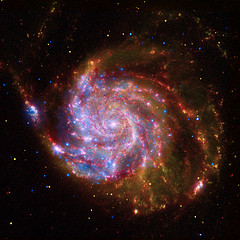 Not created on a computer using mathematics. This is A Spectacular Image to Celebrate the International Year of Astro - This image of M101 is a composite of data from NASA's Chandra X-ray Observatory, Spitzer Space Telescope, and Hubble Space 